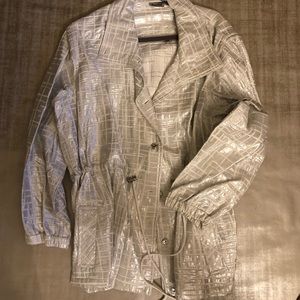 white & silver jacket.